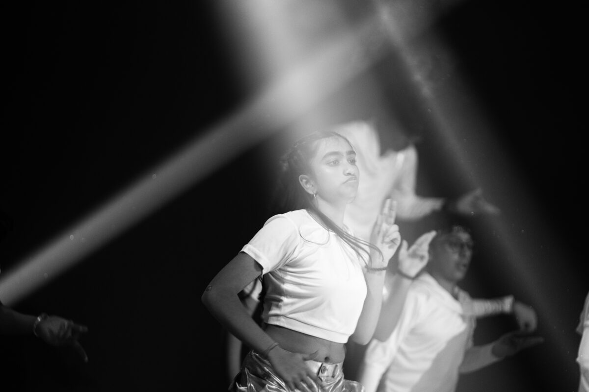 Dancer performing under stage lights at Dance Central Dubai